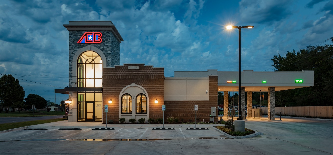 American Exchange Bank store front image at sunset